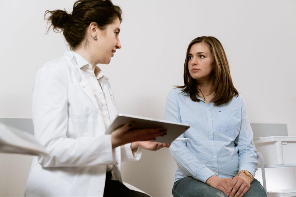 Doctor working with patient