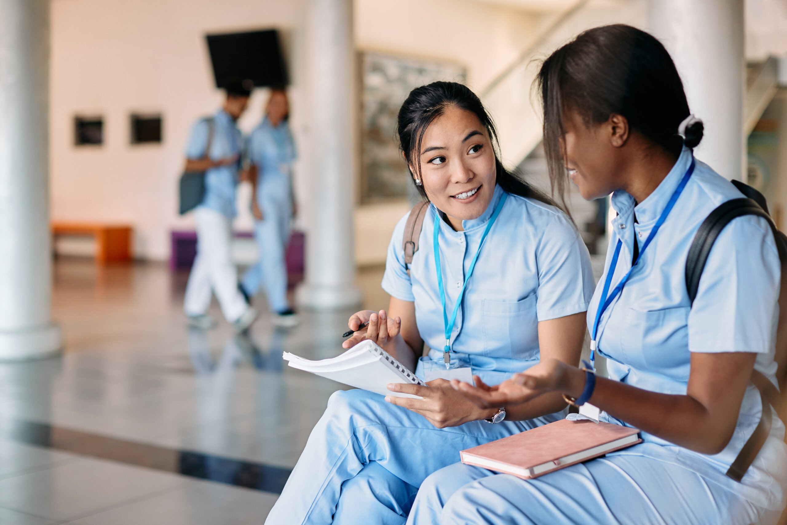 adobestock_462713322-scaled-1 Two doctors sitting a professional development course